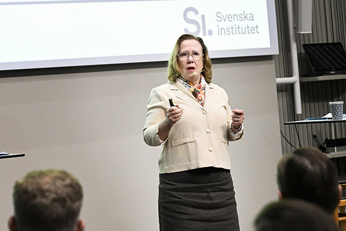 Sjöstedt talks in front of the audience