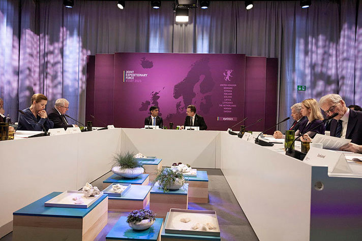 Heads of state and government, memebers of the Joint Expeditionary Force (JEF), sitting  at a conferencw table