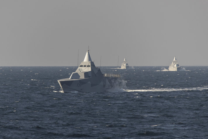 Two corvettes (small warships) out at sea.