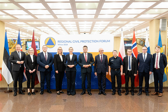 Men and women standing next to each other.